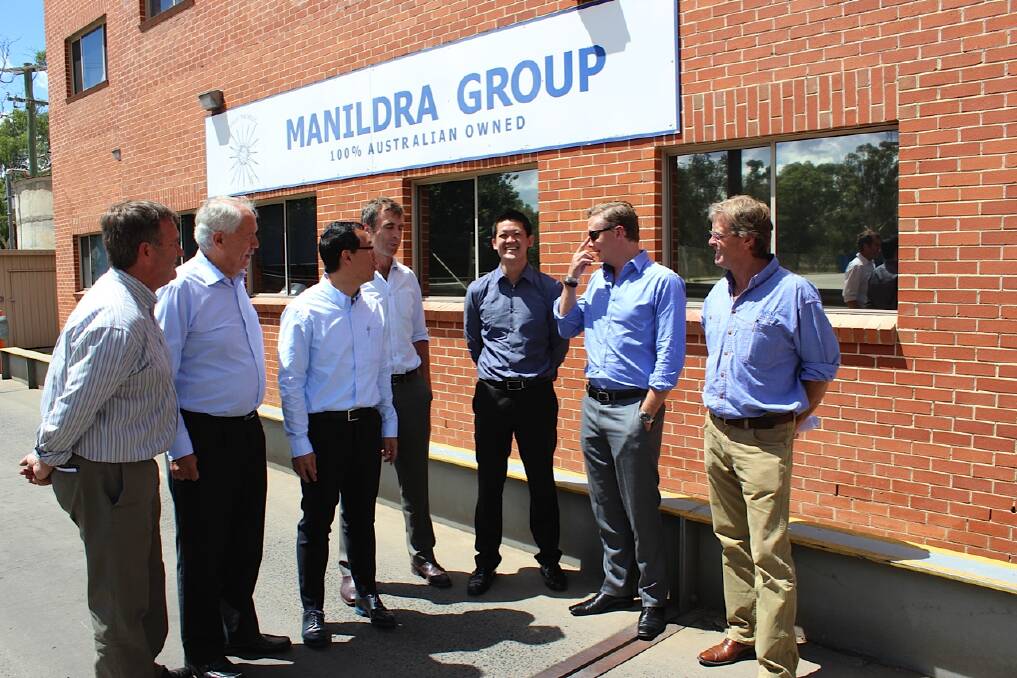 MANILDRA GOING PLACES: Manager of the Manildra Flour Mills John Brunner, Manildra Group general manager Peter Simpson, Oleo’s Vincent Lao, MSM Milling’s Peter Mac Smith, Oleo’s Franco Lao, Manildra Group product development manager Nick Barda and MSM Milling’s Bob Mac Smith celebrating signing their multi-million dollar agreement.