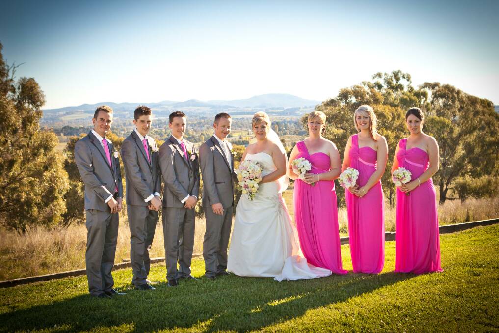  Luke Roach and Brooke Cooper with their bridal party. Photo: CHRIS BENNETTS roach 2