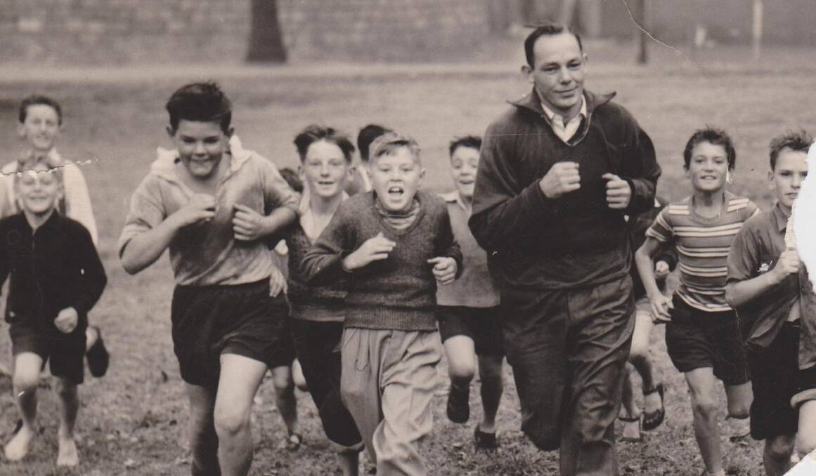 KING OF THE KIDS: Pat Ford goes for a run with some children.