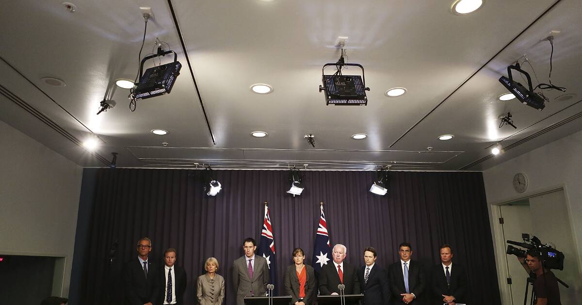 Chiefs of Australian Sporting codes, Sports Minister Kate Lundy, ASADA CEO Aurora Andruska, Minister for Justice Jason Clare and Australian Crime Commission CEO John Lawler speak to media representatives at Parliament House. Photo by Stefan Postles/Getty Images