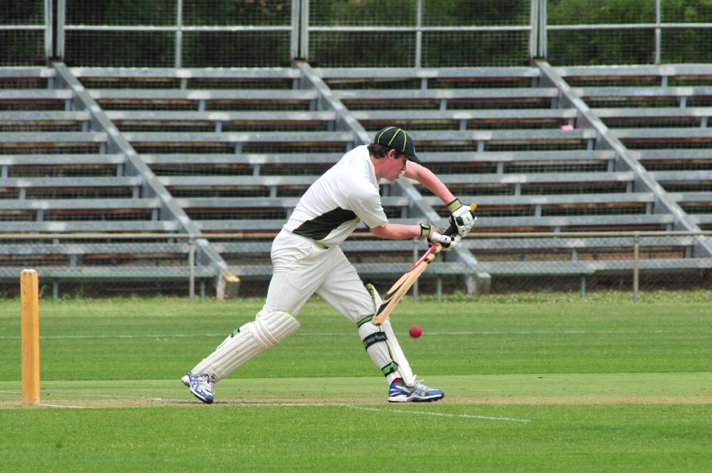 CYMS batsman Dave Neil plays his shot against centrals. Photo: JUDE KEOGH
