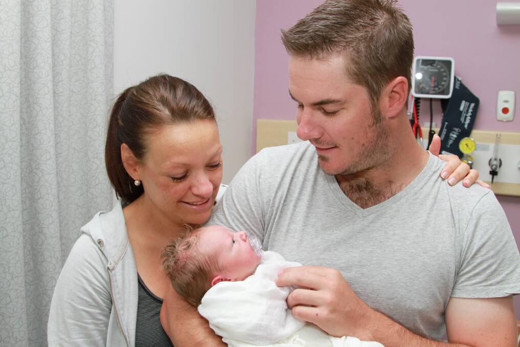 Thomas John Moss Ridding, pictured with parents Rachael and Chris Ridding, was born on January 19.